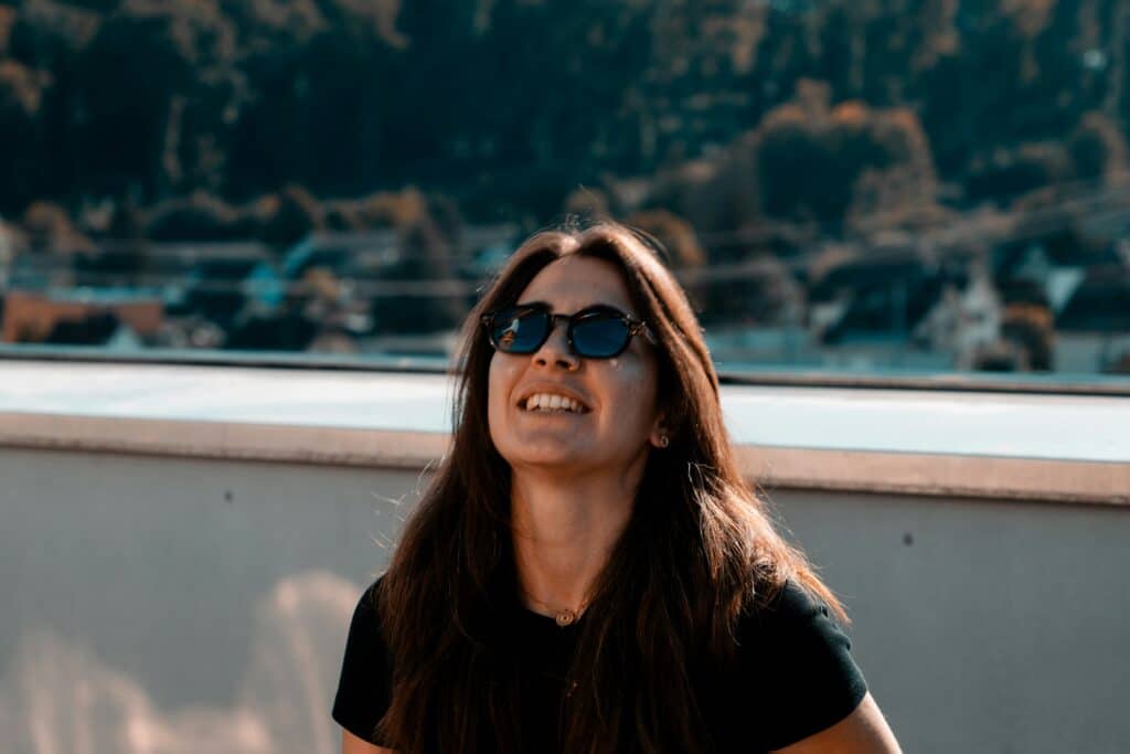 Woman looking happy and hopeful